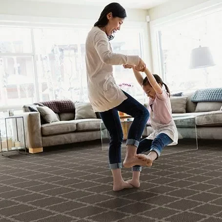 happy mom and girl | Mills Floor Covering